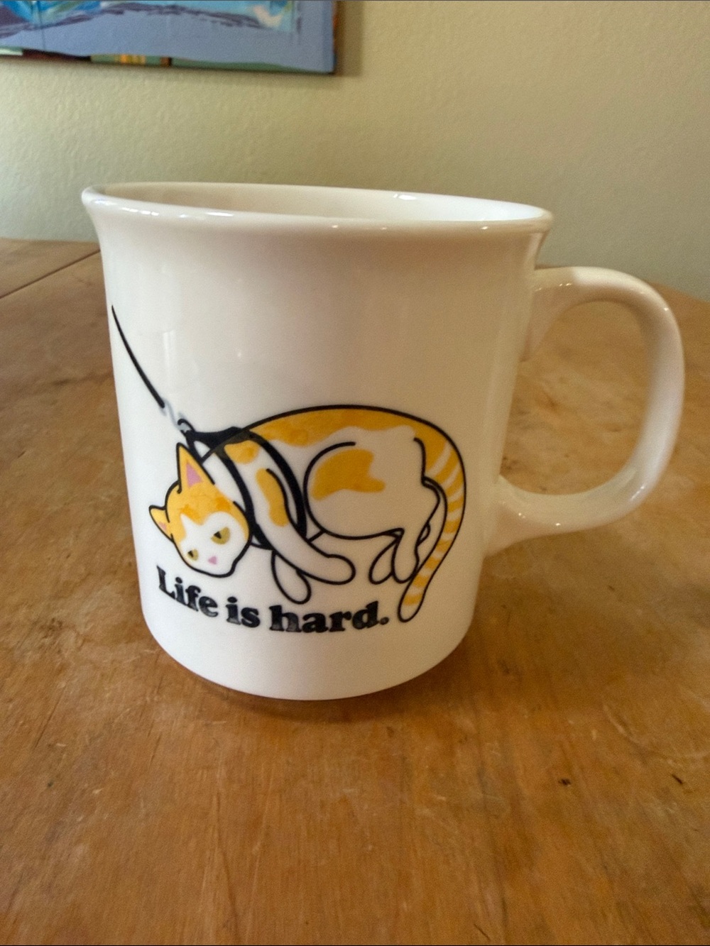 White Ceramic Cat Mug with Yellow Accent - 'Life is hard.'